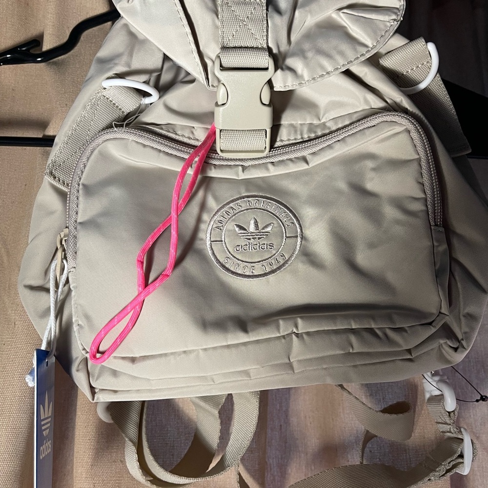 Adidas Beige Backpack with Pink Accent